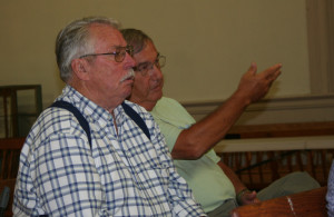 Ron Farrar (foreground) and Larry Semones bring their request for a coin drop to benefit veterans with PTSD back to the select board for  a third meeting