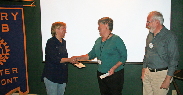 Telegraph editor and publisher Cynthia Prairie, left, presents Rotarians Nancy Davis and Ed Caron, treasurer, with a check for $300. Photo by Shawn Cunningham.