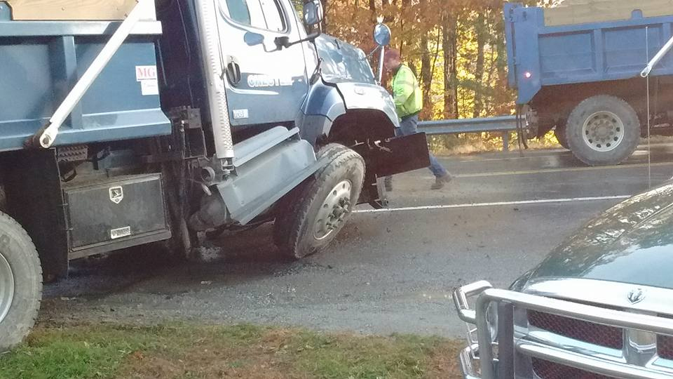 The accident occurred between a Town of Chester dump truck and a mini van. All photos by Nicholas Batchelder. 