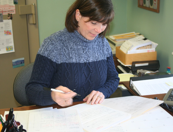 Grafton Town Clerk Kim Record looks over petitions on Monday afternoon. Photo by Cynthia Prairie.
