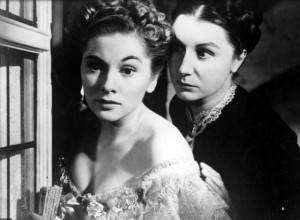 Joan Fontaine as the second Mrs. de Winter and Judith Anderson as Mrs. Danvers join Lawrence Olivier in Hitchcock suspense film. "Rebecca"