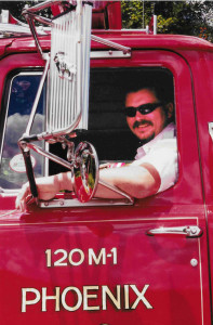 Ameden mans a Phoenix fire truck. Photo provided.