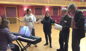 Members of cast rehearsing “Kids”, from the Broadway show “Bye, Bye Birdie”. Seated at the piano is Kasia Karazim with, standing: left to right, Aiyana Fortin, Tesha Buss, Bob Kottkamp, and Ed McEneaney.