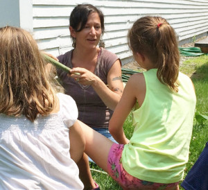 Jamie Maloof-Schilling teaches children at a Nature Museum summer camp. Credit: The Nature Museum