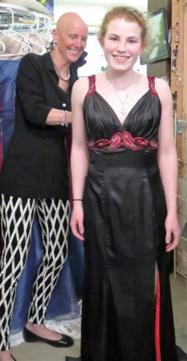 CAFC prom event coordinator and volunteer Stephanie Mahoney helps Sage select a prom dress.