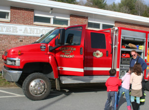 Red shows off truck to kids