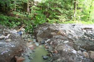 Ameden Construction will replace the culvert put in after the July 28, 2014 flood that washed out Simmonds Road. Photo by Shawn Cunningham