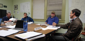 from left, Steve Prouty, Will Reed and Wayne Blanchard discuss the Road Safety Audit Review with the Windham Regional Commission's Matt Mann
