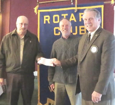 From left, Tom Hildreth and Frank Kelley of the Chester 250th Celebration receive a donation from Bill Dakin, president of the Chester Rotary.