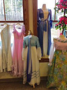 Apple Blossom Queen's Gowns and portraits on display
