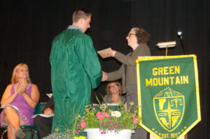 Maddy Bodin presents the Andover Scholarship to Kyle Cyr