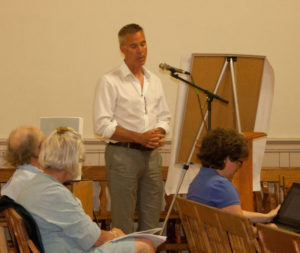 Scott Newman of Preservation Trust Vermont tells the board that PTV is willing to 'go the extra mile' for the Yosemite Firehouse.