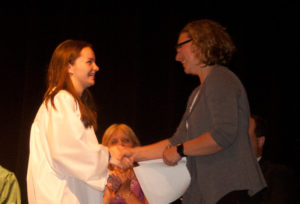 Guidance Counselor Allyson Oswald presents the Chester Education Association Memorial Scholarship to Kaitlin Wells