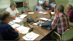 Londonderry Select Board clockwise from left, Steve Prouty, Wayne Blanchard, Bill Wylie, Road Superintendent Duane Hart, Paul Gordon and Kevin Beattie taking minutes