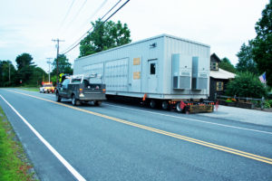 The "superload" parked along Route 103 just north of the Stone Village after taking down wires nearby.