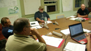 Road foreman Duane Hart tells the board of his intention to quit.