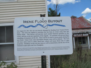 A FEMA sign explains the buyout taking place at the Genser property. Photo by Bruce Frauman