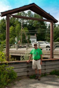 Emergency Kevin Beattie stands at the training wall, whose existence is preventing completion of a FEMA buyout. Photos by Cynthia Prairie