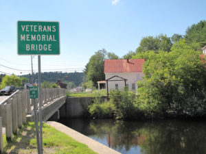 The training wall and Genser property as seen from the east side of the Veterans Memorial Bridge. Photo by Bruce Frauman
