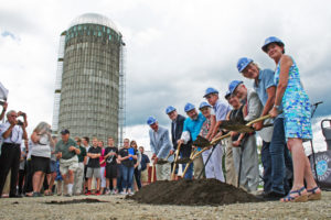 In the shadow of the Walker Farm silo, WPTC breaks ground for a new center for the arts. From left, Wayne Granquist, Oliver Olsen, Steve Stettler, Beverly Walker Roberts, Francis Walker, Carol Cox, Anthony Wood, Christopher Lloyd and Leslie Koenig. Photos by Shawn Cunningham