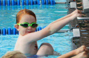 Find out about the swim team program during an introductory course