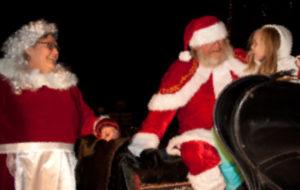 Santa and Mrs. Claus greet kids at the Londonderry tree lighting.