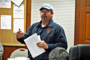 Fire Chief Wes Hupp reports on the problems with two firetrucks and discusses the state loan fund solution. Photos by Bruce Frauman
