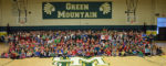 Big kids, little kids pose on last day together at GM