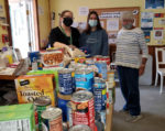 GM Interact Club food drive benefits Food Shelf; Whiting Library grant to help boost community