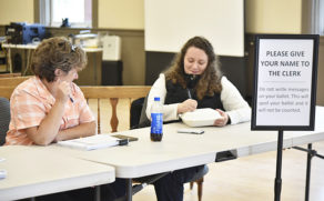 Chester Town Manager Julie Hance, left, chats with her daughter Meekah during a lull in voting.